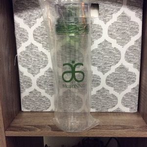 Arbonne Pom Fizz and water bottle
